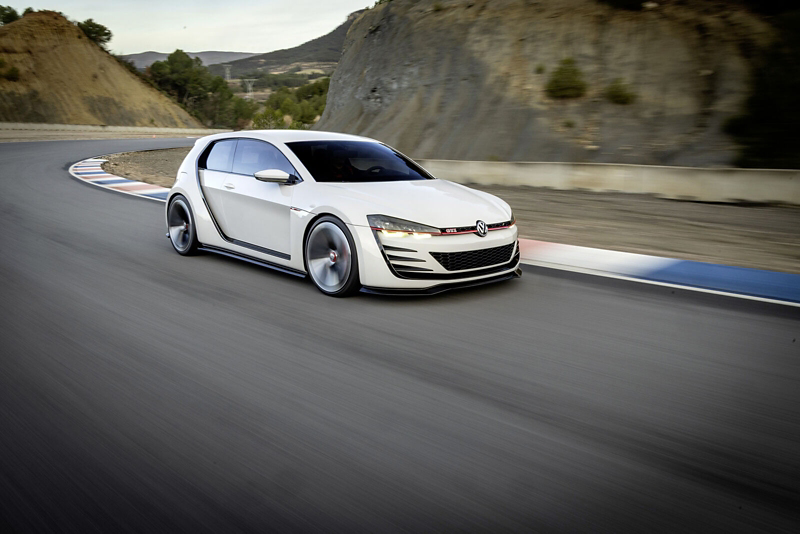 a sleek white Golf GTI concept car driving on a race track