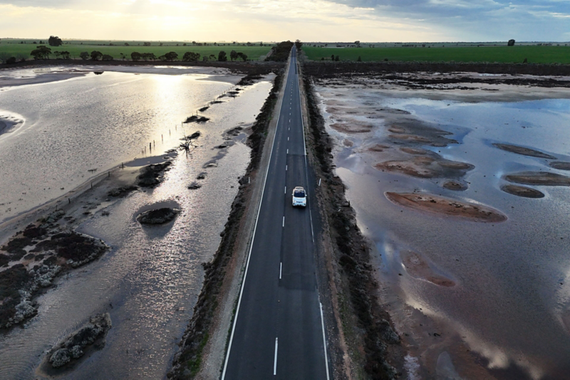 ID.4 driving across road with water on each side