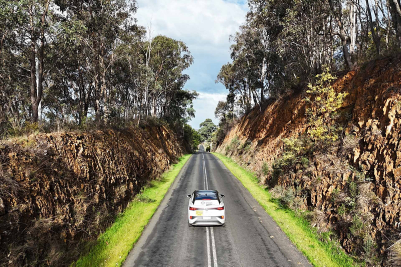 ID.4 driving through mountain terrain