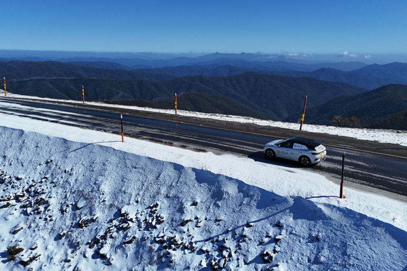 ID.4 driving through snowy mountains