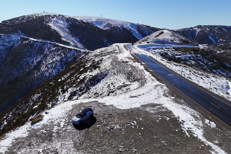 ID.4 parked on snowy mountain edge