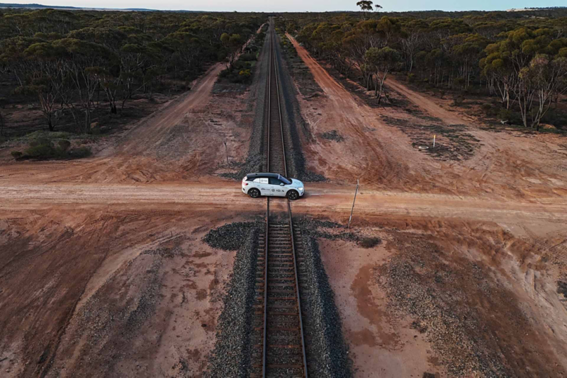 ID.4 driving over trainline in desert