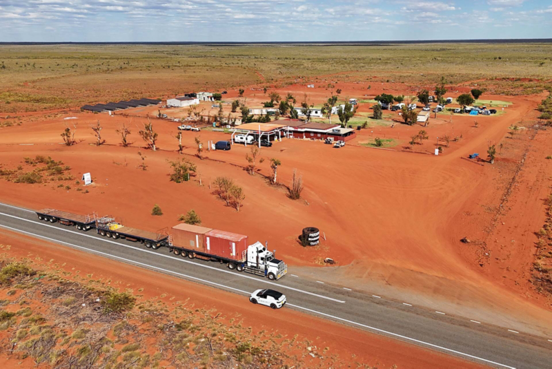 Ariel view of ID.4 driving through desert town