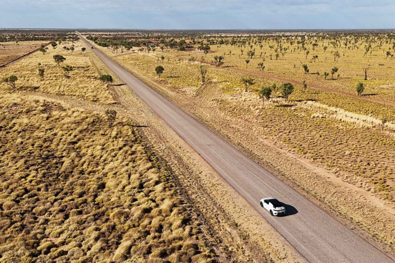 Ariel shot of ID.4 driving through desert