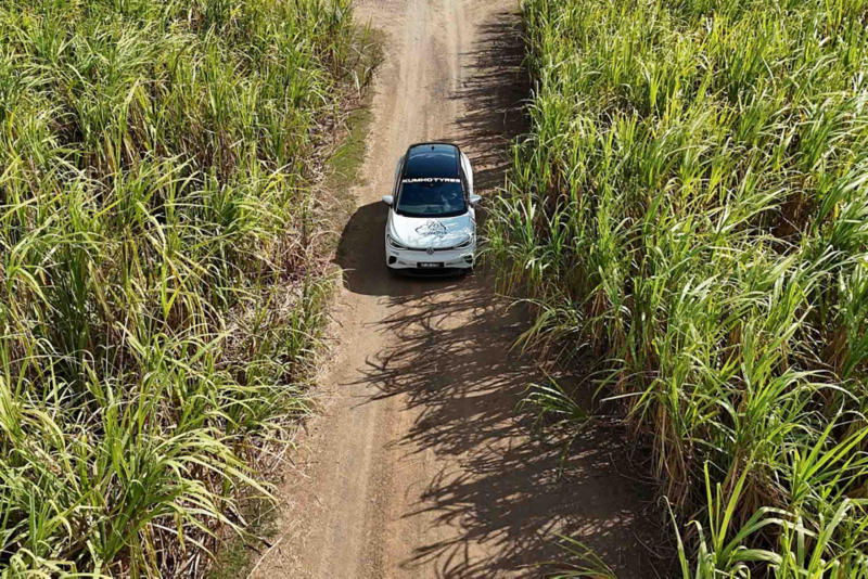 ID.4 ariel view driving through farmland