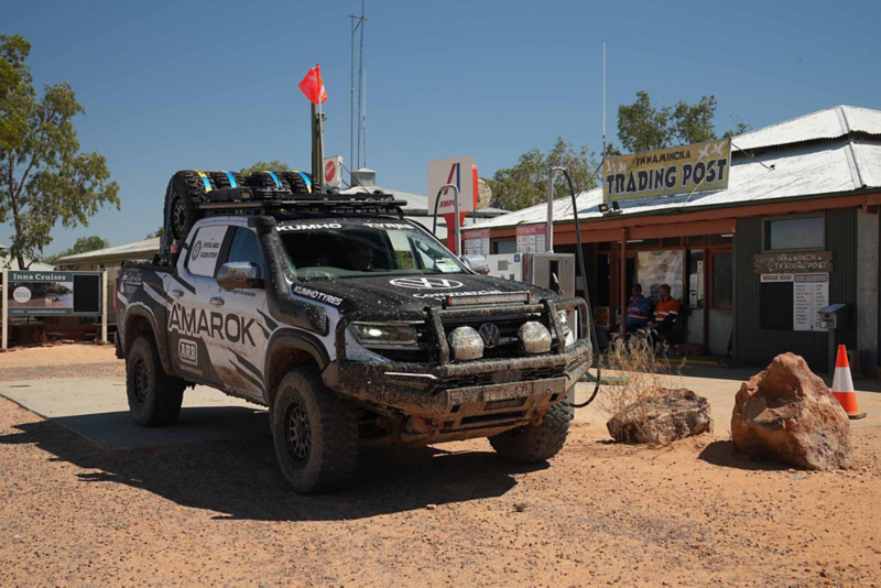 Amarok parked outside shop in desert