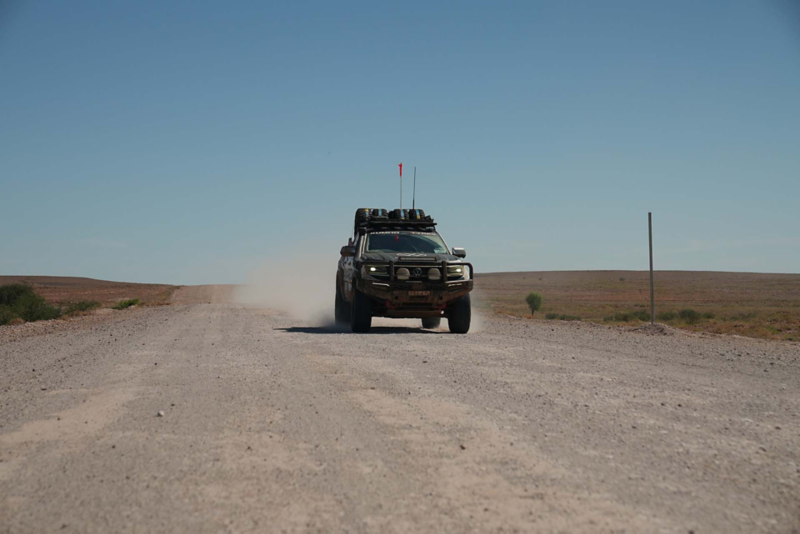 Front view of Amarok driving on open desert road