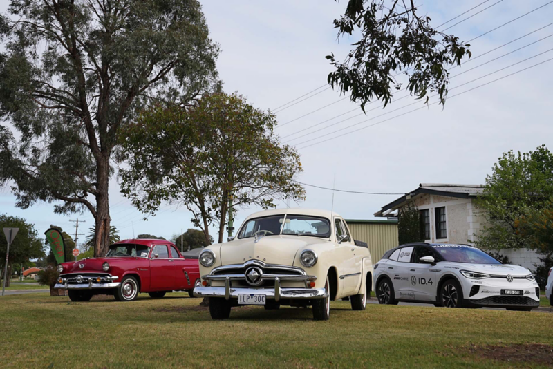 ID.4 parked next to vintage cars
