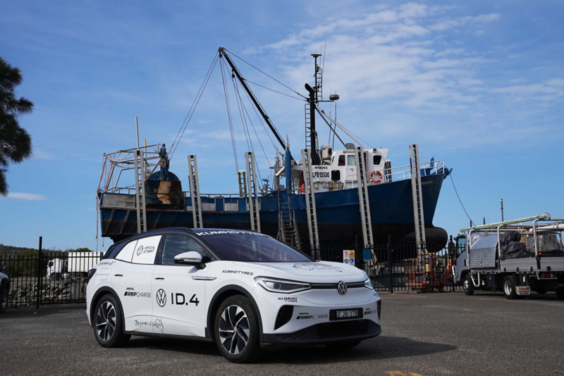 ID.4 parked in front of old boat