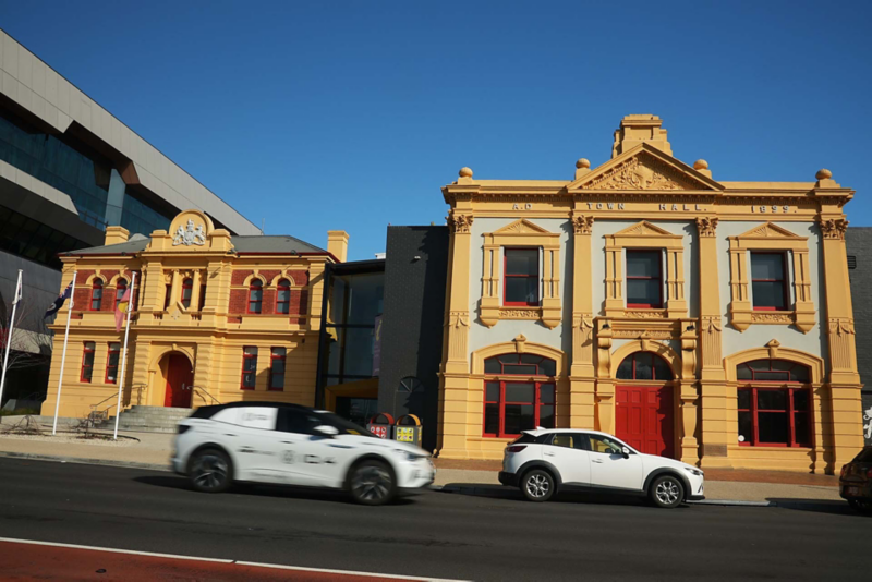 ID.4 driving past town hall