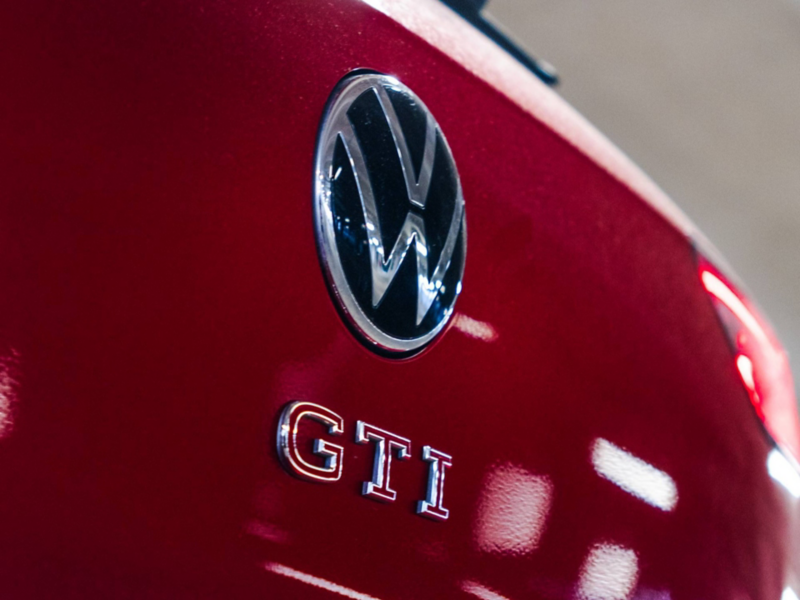 Closeup of the GTI badge on a red Golf GTI
