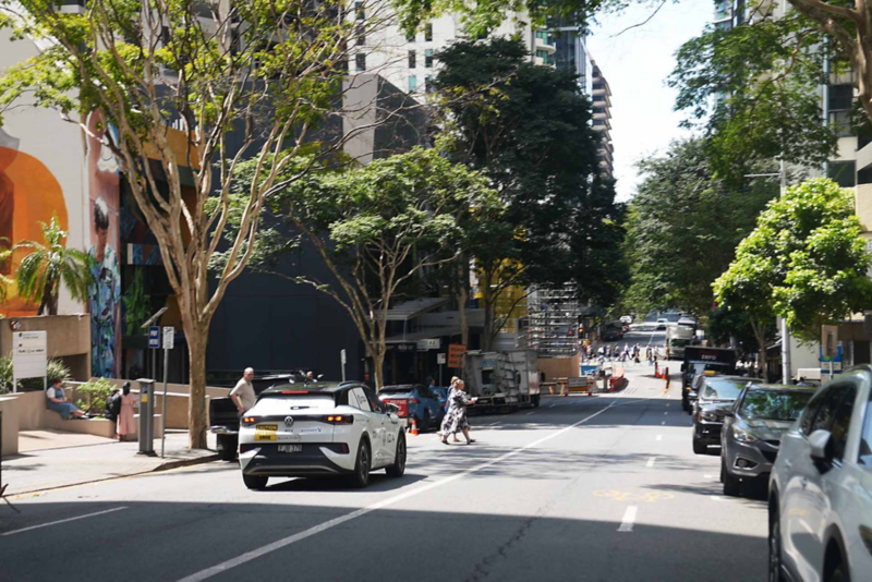 View of ID.4 driving through city street