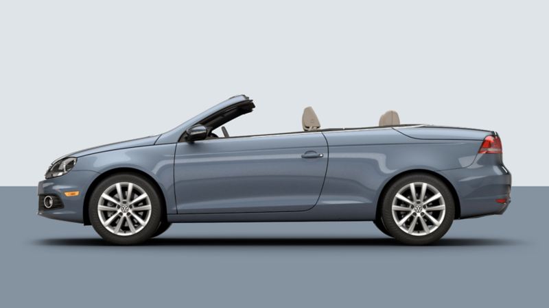Side view of a volkswagen Eos in a studio background