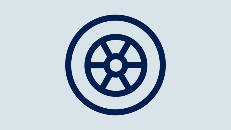 Outline icon of a car wheel or tire with six spokes radiating from the center.