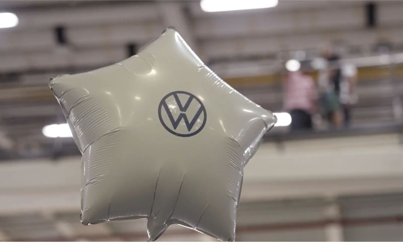 Helium balloon with VW logo.