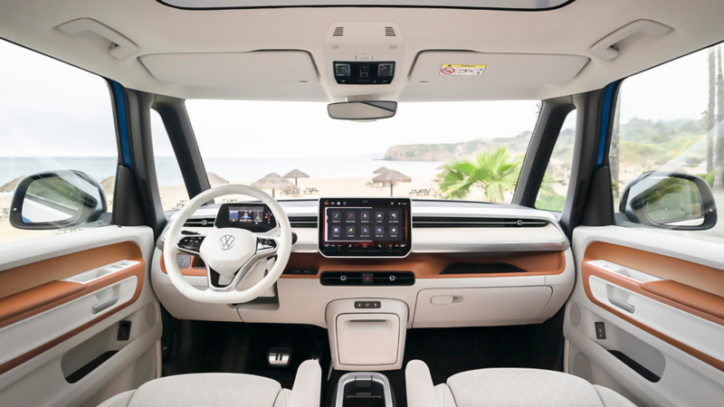 Interior view of the Volkswagen ID. Buzz driver's area highlighting the clear visibility through the large windows, with a snowy winter landscape visible outside.