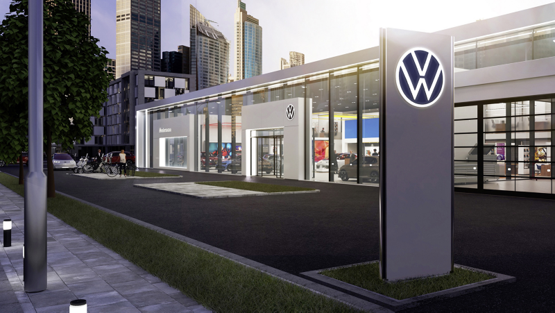 Woman at her Volkswagen's retailer