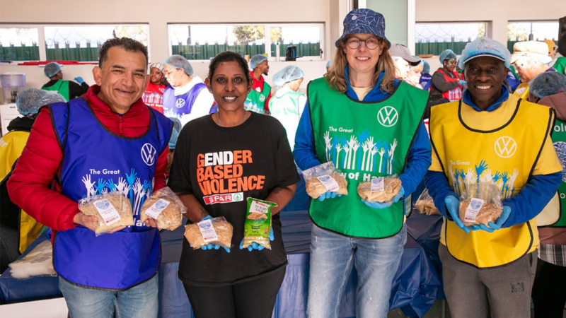employees show hands for charity  