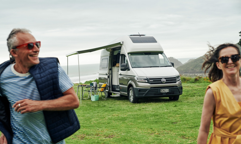 Grand California parked with side tent