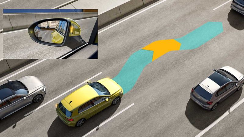 A VW Golf in traffic using the optional Side Assist lane change system.