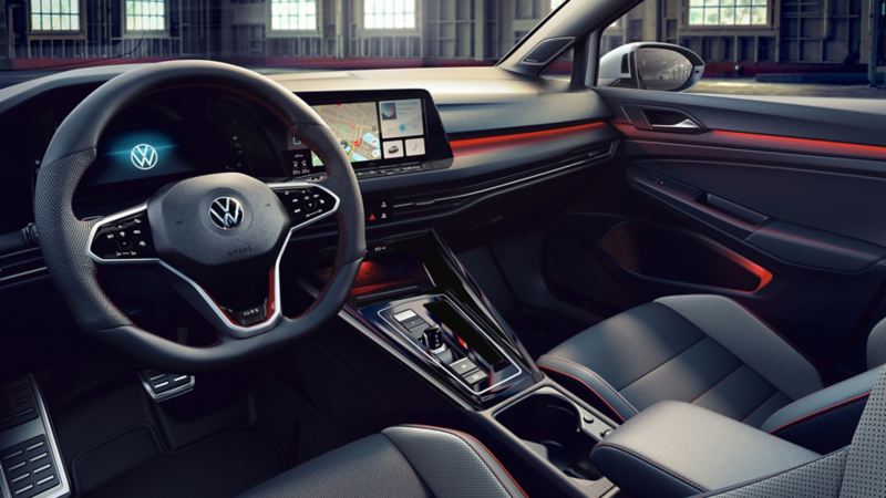 VW Golf GTI Clubsport interior: multifunction sports steering wheel, red background lighting and sports seats. 