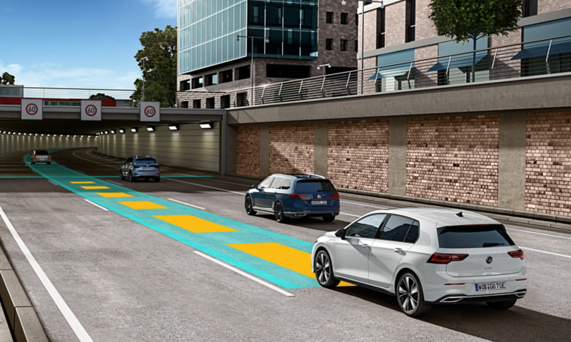 VW Golf in traffic, using the optional Travel Assist.