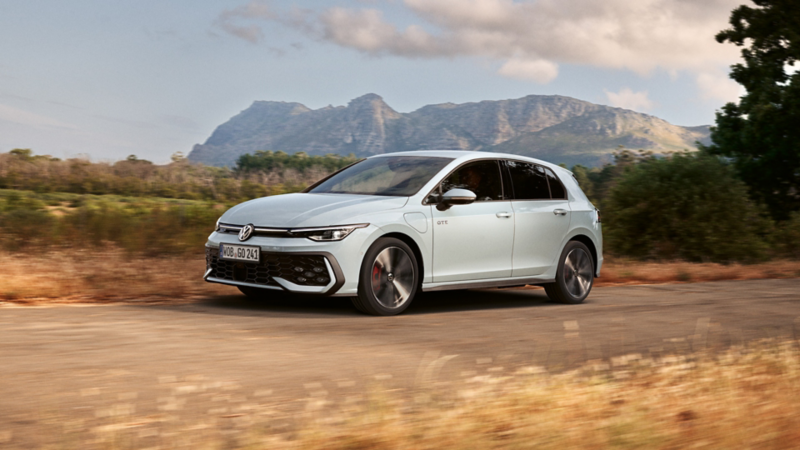 a new Golf GTE driving through a desert