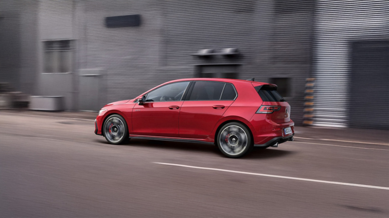 Side view of a Golf GTI in motion.