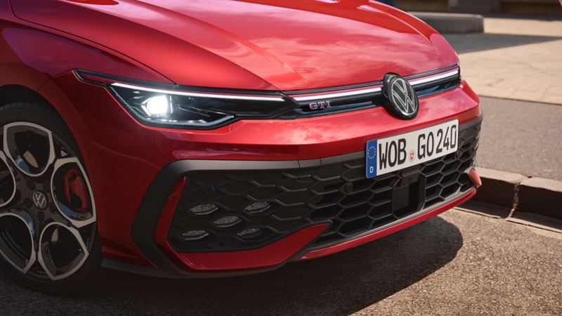 Front view of the red Golf GTI with IQ.Light