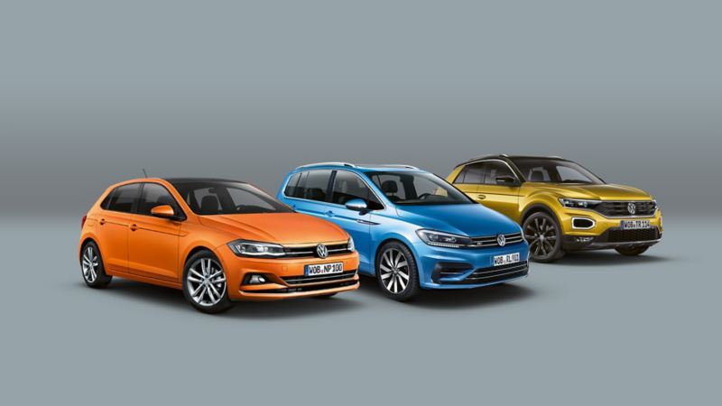 Range aus VW Polo, VW Sharan, VW T-Roc vor grauem Hintergrund