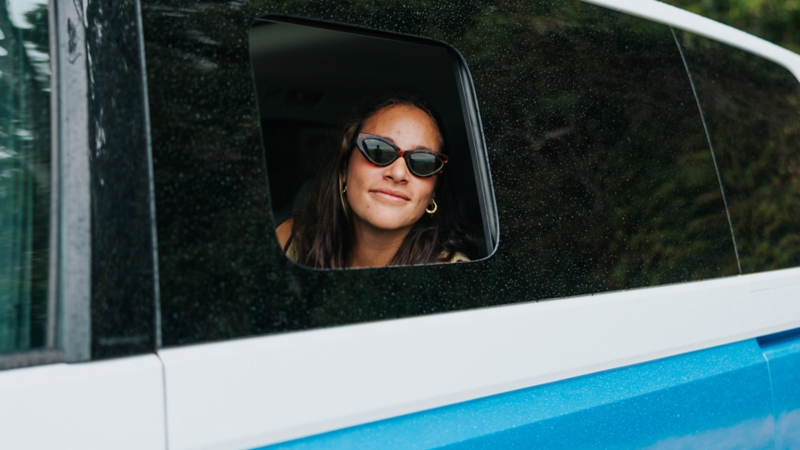 Woman looking out ID. buzz