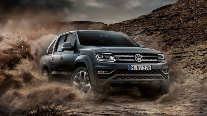 VW Amarok driving through mud