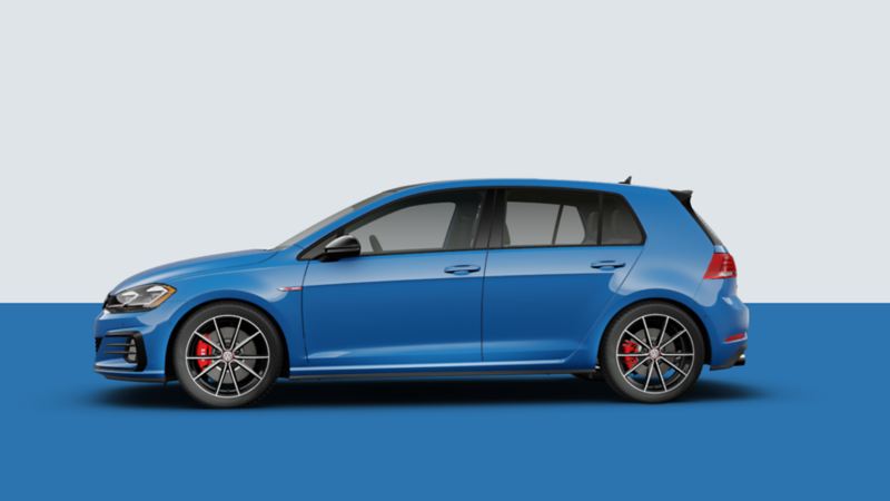 Side view of a volkswagen Golf GTI in a studio background