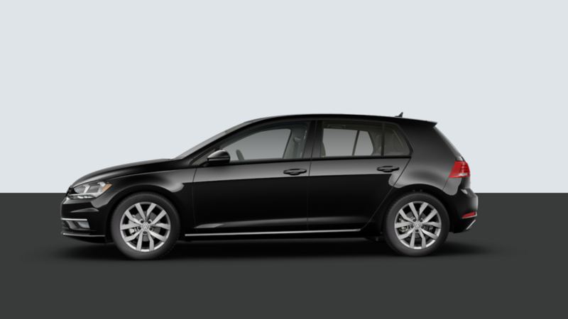 Side view of a volkswagen Golf in a studio background