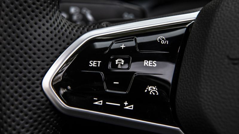 A close up of the controls on the 2024 Golf GTI steering wheel