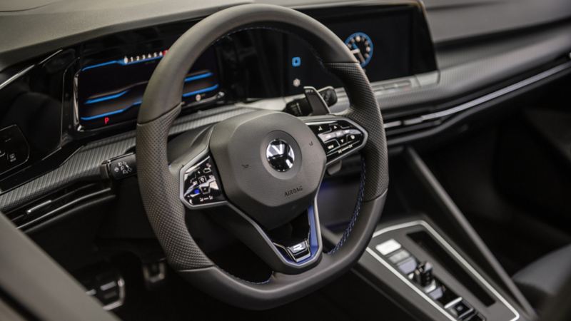 A close up of the steering wheel of the 2024 Golf R