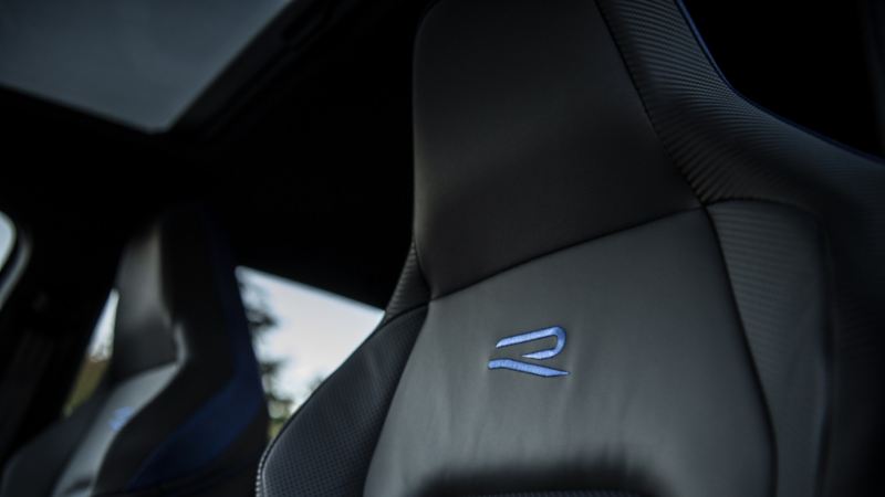 A close up of the 2024 Golf R seat showing the embroidered R logo