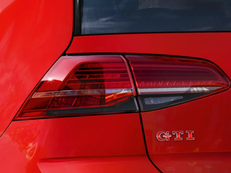 Close-up of the GTI badge on a red Golf GTI