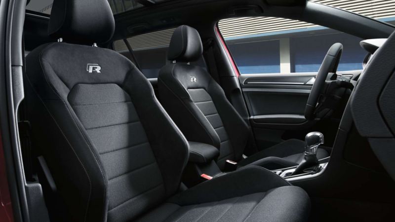 The sport bucket seats in dark leather inside the Volkswagen Golf R interior
