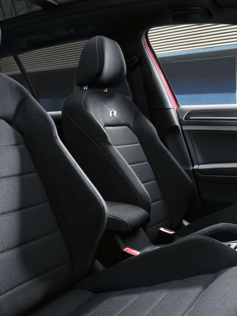 The sport bucket seats in dark leather inside the Volkswagen Golf R interior