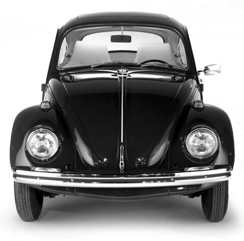 A black and white photo of historic Beetle, shown from the front.