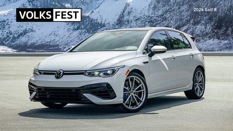 A Pure White VW Golf R by a wintery mountainscape.