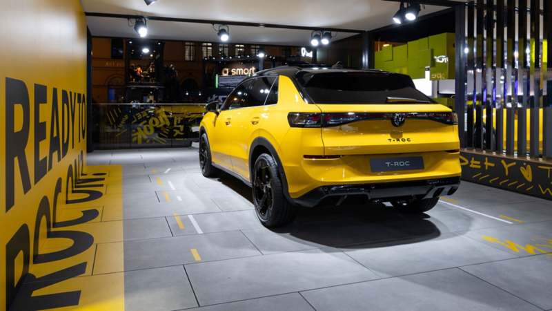 Yellow Volkswagen T-Roc at the Volkswagen exhibition stand.