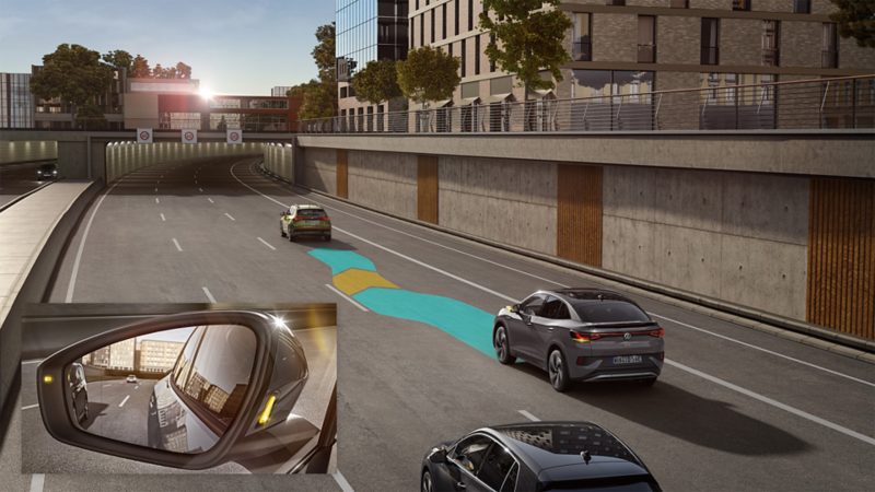 a Volkswagen driving along a road demonstrating side and lane assist