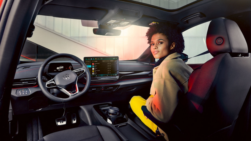 Woman sitting inside an ID.4 GTX