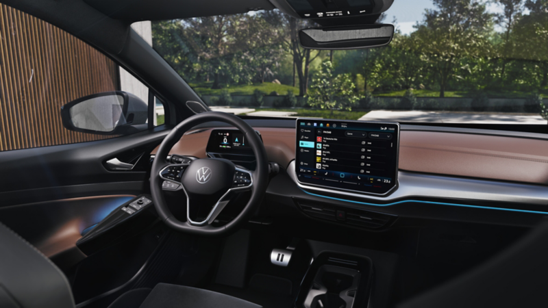 Interior view of a VW ID.5, view from behind to front seats, to the steering wheel and the dash panel