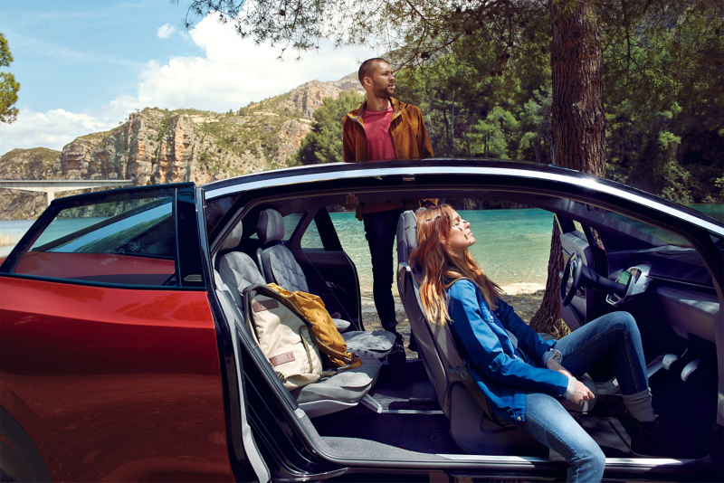 Female passenger sitting in Volkswagen ID vehicle