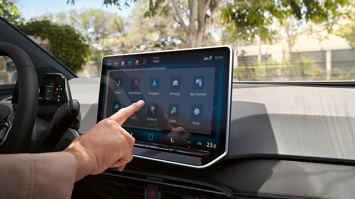Driver interacting with touchscreen display