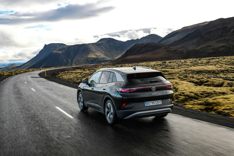 VW car driving through mountains