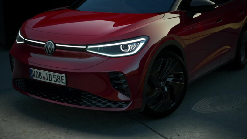 Animation af den tændte frontlyssignaturen på en rød VW ID.5 GTX.